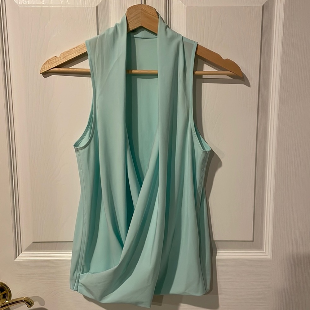 Lululemon wrap tank tags removed most likely a size 2/4. Worn lightly.